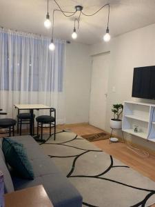 a living room with a couch and a table at 807. Departamento entero en Chorrillos in Lima