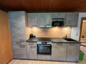Kuchyň nebo kuchyňský kout v ubytování Ferienwohnung Tux