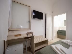 Postel nebo postele na pokoji v ubytování Torre del Salento