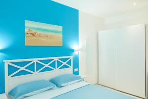 Ένα ή περισσότερα κρεβάτια σε δωμάτιο στο Private room and pool in the beach free wi-fi