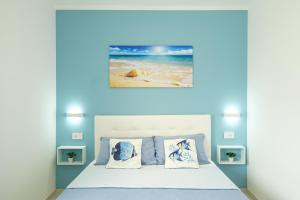 Ένα ή περισσότερα κρεβάτια σε δωμάτιο στο Private room and pool in the beach free wi-fi