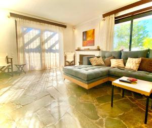 A seating area at Villa Naya by the Beach