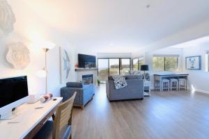 a living room with a couch and chairs and a table at Royal Villa - Ocean View - Heated Pools - SEASCAPE'S BEST 1 BEDROOM - 3 BEDS - End Unit in Aptos