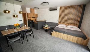 Ένα ή περισσότερα κρεβάτια σε δωμάτιο στο Hotel Kras