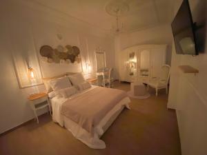 Postel nebo postele na pokoji v ubytování Appartement avec JACCUZI PRIVATISÉ TOTALEMENT GRATUIT SANS SUPPLÉMENT