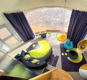 a room with a tent with a bed and a room with a window at Clear Sky Resorts - Grand Canyon - Unique Sky Domes in Valle