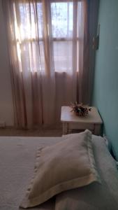 Ein Bett oder Betten in einem Zimmer der Unterkunft Casa Isabella