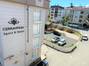 an aerial view of a hotel with a parking lot at Cerrahpasa Apart Hotel in Trabzon