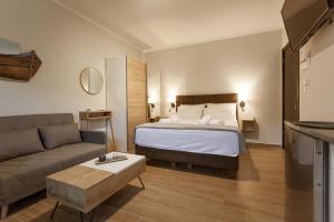 Ένα ή περισσότερα κρεβάτια σε δωμάτιο στο Serenity Studio for couples