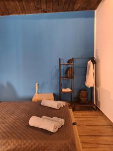 a bedroom with two rolled towels on a bed at Eco&Narciso apartment in Monreale