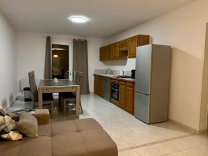 Η κουζίνα ή μικρή κουζίνα στο Les Rives des Montagnes +10 φωτογραφίες