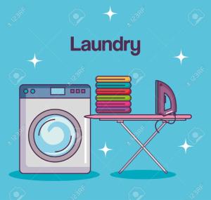 a washing machine and a table with books at El Cocobolo Food&Rest Room 6 Bed and Breakfast WiFi AC Pkg gratis in Liberia