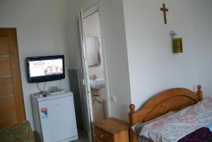 TV a/nebo společenská místnost v ubytování Druzhba 598