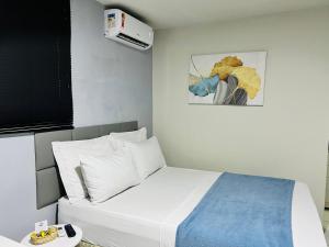 Postel nebo postele na pokoji v ubytování Edifício Creta Hotel + 37 fotografií