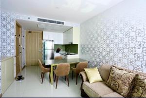 a kitchen and living room with a table and a couch at LuxSL Luxury Style of Life 6 in Jomtien Beach