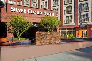 a building with a sign for a silver cloud hotel at Silver Cloud Hotel - Seattle Broadway in Seattle