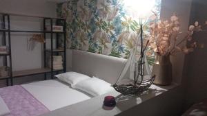 Postel nebo postele na pokoji v ubytování Areti Rooms Hotel