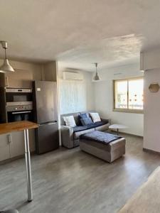 Køkken eller tekøkken på Duplex, en bord de mer 2 chambres