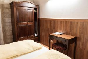 Voodi või voodid majutusasutuse Albergo Garni Orchidea toas