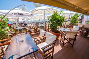 A restaurant or other place to eat at THEMIS BEACH