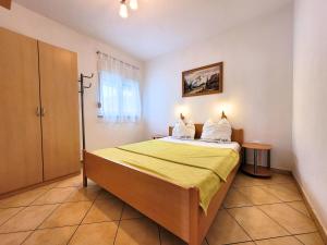 Posteľ alebo postele v izbe v ubytovaní Apartment Jelena Vir