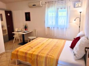 Posteľ alebo postele v izbe v ubytovaní Apartment Jelena Vir