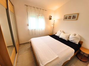 Posteľ alebo postele v izbe v ubytovaní Apartment Jelena Vir