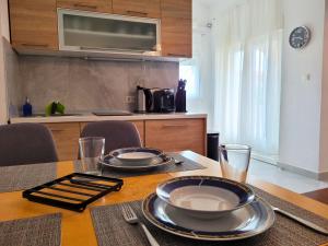Kuchyňa alebo kuchynka v ubytovaní Apartment Jelena Vir