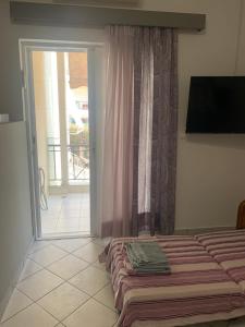 Posteľ alebo postele v izbe v ubytovaní Garden Lefkanti, 4season Plaza Room