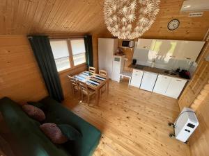 an overhead view of a living room and kitchen in a cabin at Relax domki Zator in Zator