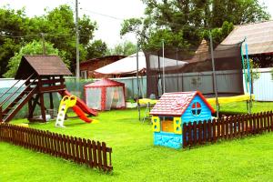 a playground with many different types of play equipment at Pensiunea Beatrice in Sovata