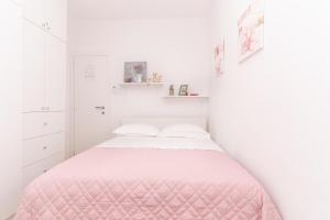 Ein Bett oder Betten in einem Zimmer der Unterkunft Apartment Cameleon