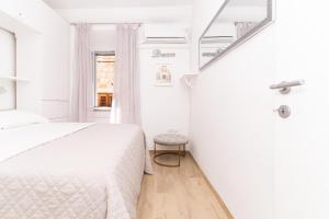 Ein Bett oder Betten in einem Zimmer der Unterkunft Apartment Cameleon