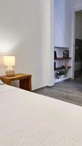 Uma cama ou camas num quarto em Dimora Donna Vitalia Apartments
