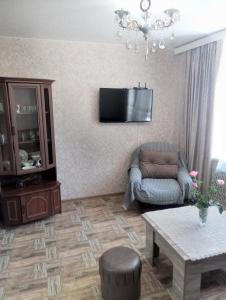 TV a/nebo společenská místnost v ubytování Art-Rabath