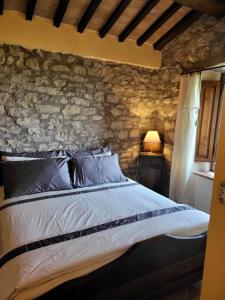 Country House La Collina di Bargiano - Casa Raffaella客房内的一张或多张床位