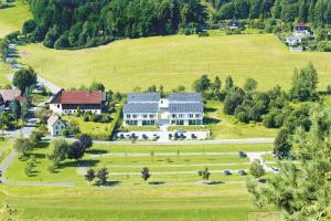 an aerial view of a large house in a field at Elbresort Kurort Rathen in Rathen