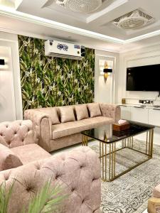 TV/trung tâm giải trí tại Emeralds Villa Islamabad +14 ảnh