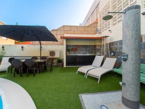 Patio alebo iná vonkajšia časť ubytovania Balcón de Costanera