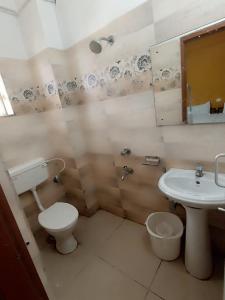 Koupelna v ubytování BRUNDABATI YATRI NIWAS