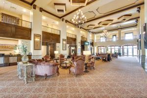 a lobby with couches and chairs in a building at Loretto Vacation Rental with Community Resort Perks in Loretto