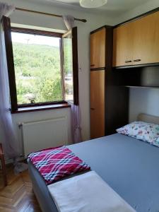 Ένα ή περισσότερα κρεβάτια σε δωμάτιο στο Summer 4