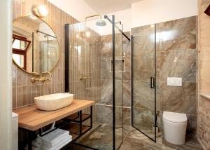 a bathroom with a sink and a shower at Holiday Home Skala with hot tub & Kala with terrace in Pitve +53 photos