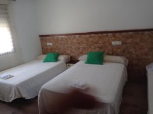 Postel nebo postele na pokoji v ubytování La Via Verde