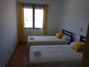 Postel nebo postele na pokoji v ubytování La Via Verde