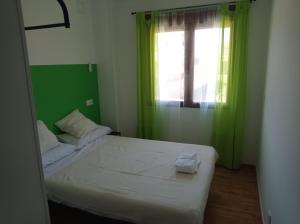 Postel nebo postele na pokoji v ubytování La Via Verde