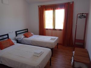 Postel nebo postele na pokoji v ubytování La Via Verde