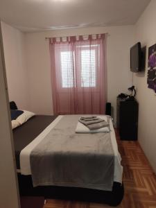 Posteľ alebo postele v izbe v ubytovaní Deep blue apartment