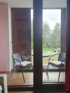 Area tempat duduk di Apartmani Gavric Borovi 2