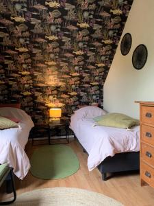 Giường trong phòng chung tại Brinkesdiek